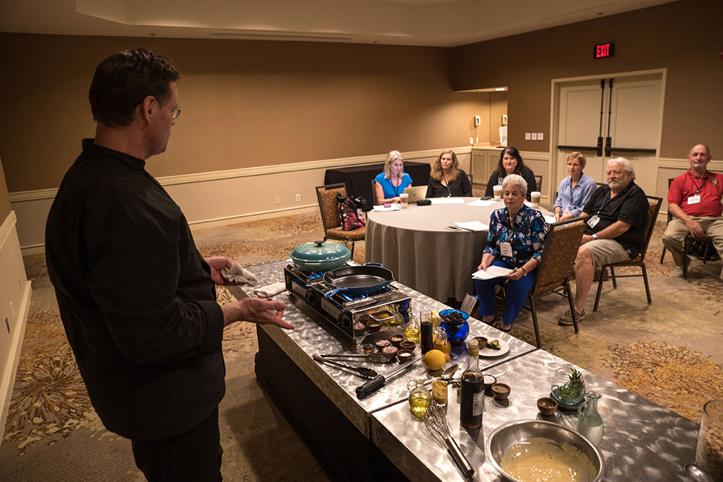 2016 FTA Summit attendees participate in a cooking class at the Westin La Paloma