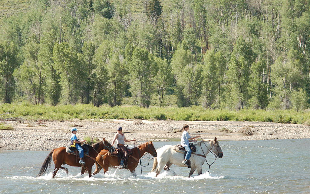 Goosewing-Ranch-Riding-the-River